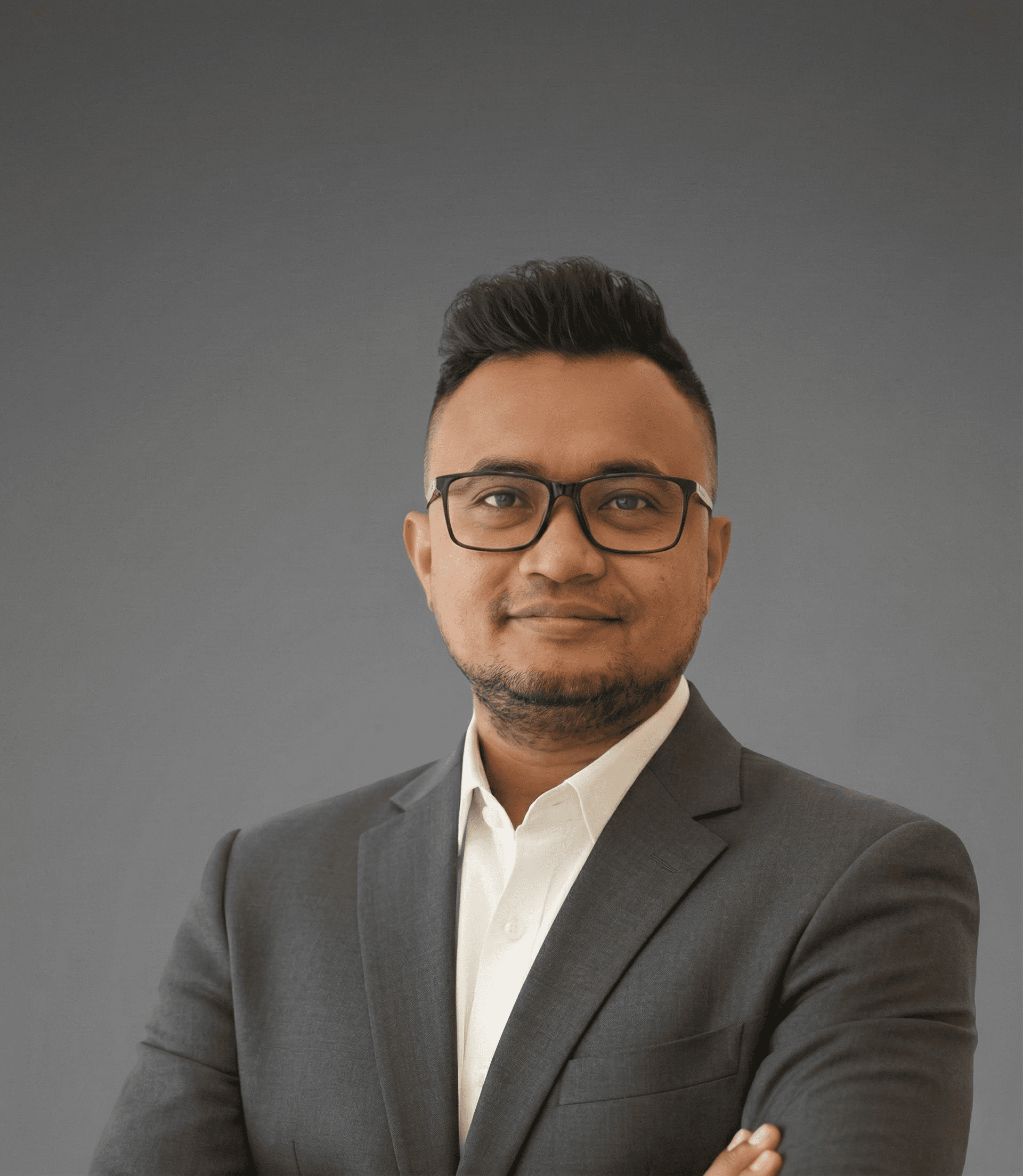 Arvin, Indonesian hair stylist at Miin Jakarta wearing glasses