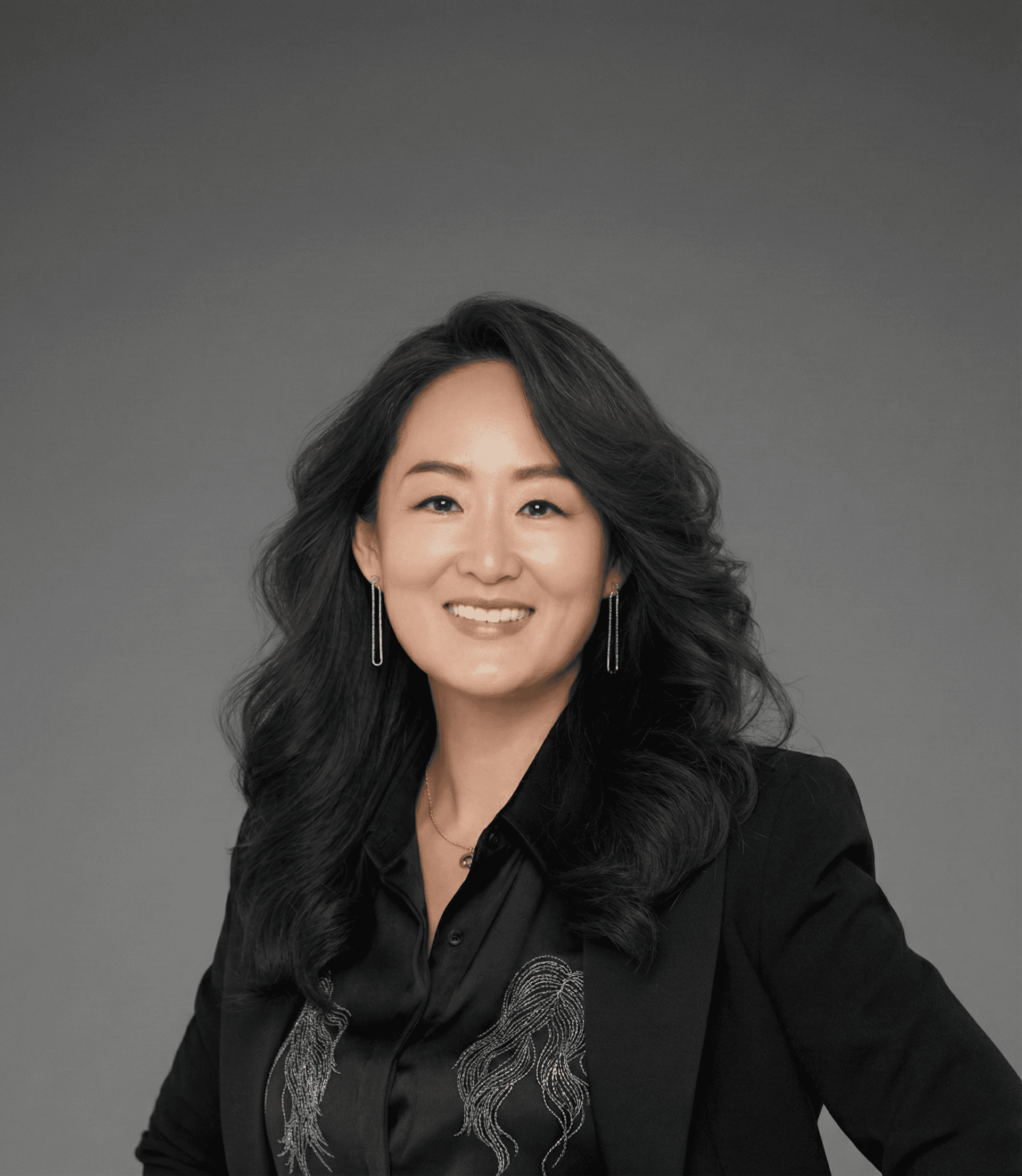 Linda, hair stylist at Miin Jakarta wearing a black blazer